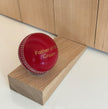 Personalised Cricket Ball Doorstop – Handmade in Oak